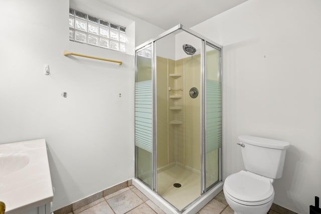 5110 W Lake Shore Dr, Wonder Lake, IL 60097 - bathroom featuring a stall shower, vanity, and tile patterned flooring