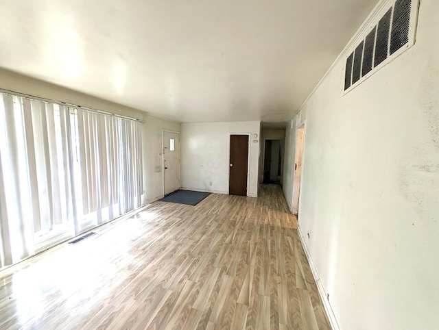 451 Tahoe St, Park Forest, IL 60466 - empty room with light wood-style flooring and baseboards