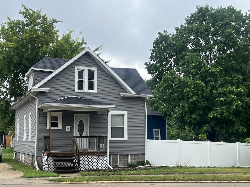 908 E 4th St, Sterling, IL 61081 - view of front of house featuring covered porch and a shingled roof