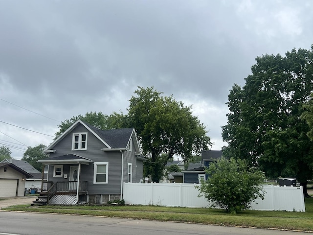 908 E 4th St, Sterling, IL 61081 - view of front of house featuring roof with shingles