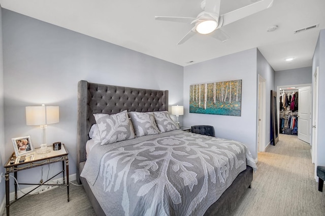 50 N Plum Grove Rd Unit 502E, Palatine, IL 60067 - carpeted bedroom with baseboards, a ceiling fan, a walk in closet, and a closet