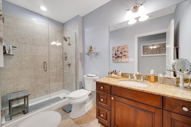 50 N Plum Grove Rd Unit 502E, Palatine, IL 60067 - bathroom with toilet, tile patterned floors, a stall shower, and vanity
