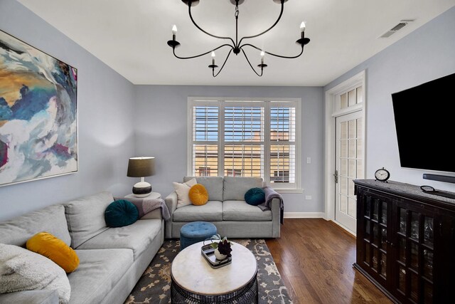 50 N Plum Grove Rd Unit 502E, Palatine, IL 60067 - living room featuring wood finished floors, a chandelier, and baseboards
