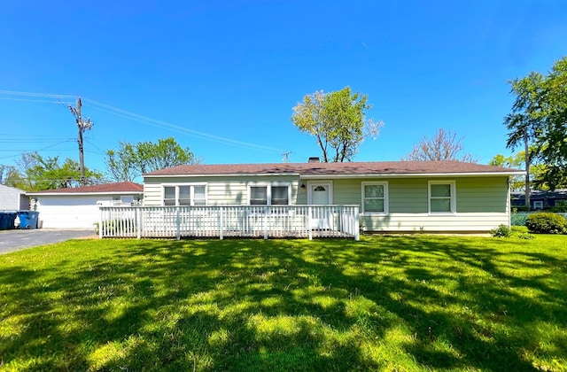 3403 Susan Ln, Steger, IL 60475 - single story home featuring a front lawn, a garage, and an outbuilding