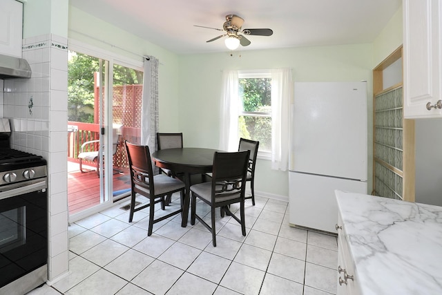 1N485 Neltnor Blvd, West Chicago, IL 60185 - dining area with healthy amount of natural light, light tile patterned flooring, and ceiling fan