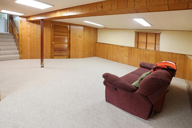 1N485 Neltnor Blvd, West Chicago, IL 60185 - carpeted living room with wood walls, stairway, and wallpapered walls