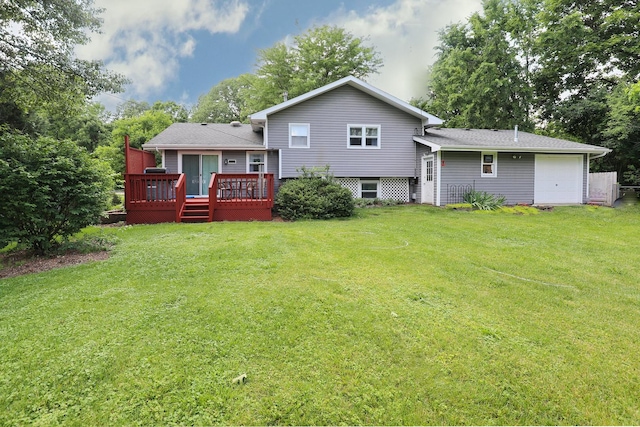 1N485 Neltnor Blvd, West Chicago, IL 60185 - rear view of property with a yard, a wooden deck, and an attached garage