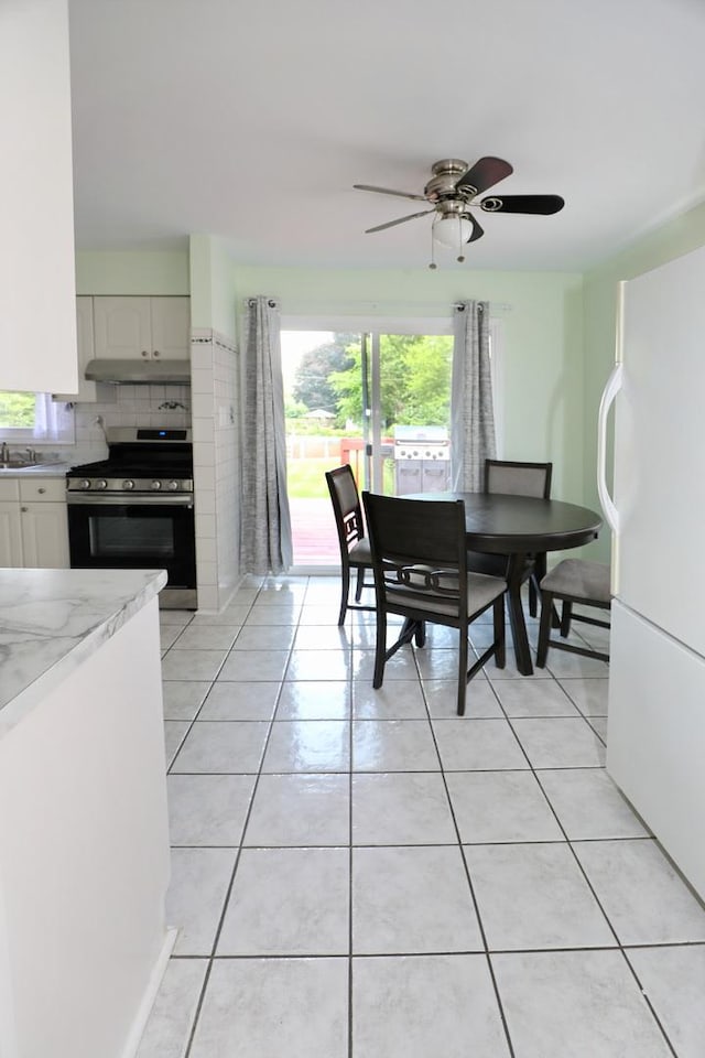 1N485 Neltnor Blvd, West Chicago, IL 60185 - dining space with light tile patterned floors and a ceiling fan