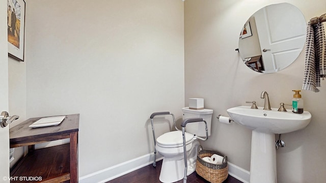 8 E Kennedy Ln Unit 302, Hinsdale, IL 60521 - bathroom featuring toilet and wood finished floors