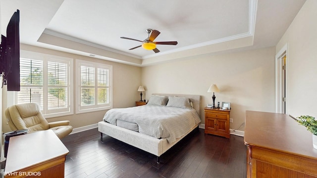 8 E Kennedy Ln Unit 302, Hinsdale, IL 60521 - bedroom featuring a tray ceiling, ornamental molding, dark wood-style floors, and a ceiling fan