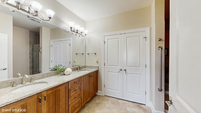 8 E Kennedy Ln Unit 302, Hinsdale, IL 60521 - bathroom with double vanity and a stall shower