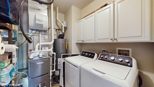 8 E Kennedy Ln Unit 302, Hinsdale, IL 60521 - laundry room featuring independent washer and dryer, cabinet space, and water heater