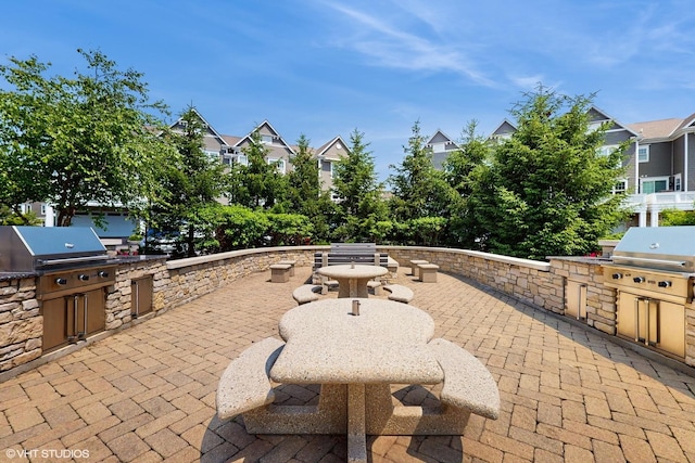 8 E Kennedy Ln Unit 302, Hinsdale, IL 60521 - view of patio / terrace featuring exterior kitchen and a residential view