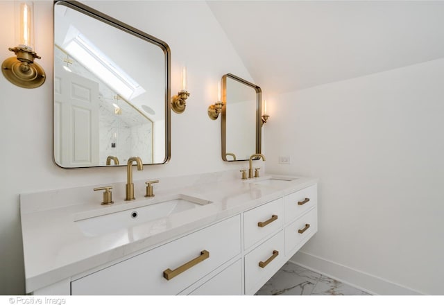 912 W Barry Ave Unit 3, Chicago, IL 60657 - full bath with marble look tile flooring, double vanity, baseboards, and vaulted ceiling