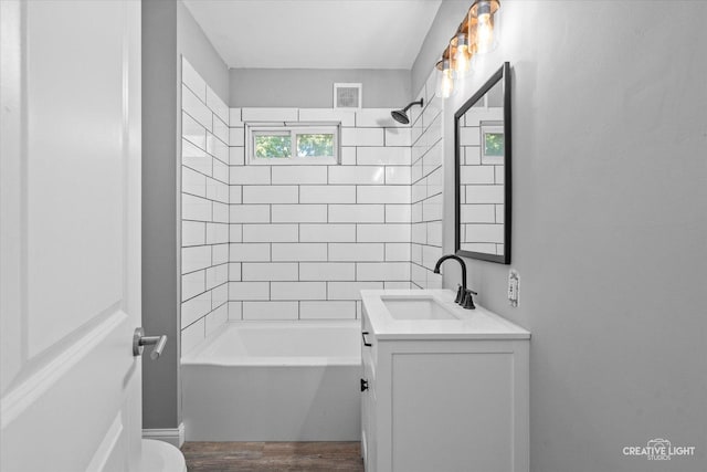 455 N River St, Montgomery, IL 60538 - full bath with vanity, wood finished floors, and shower / bath combination