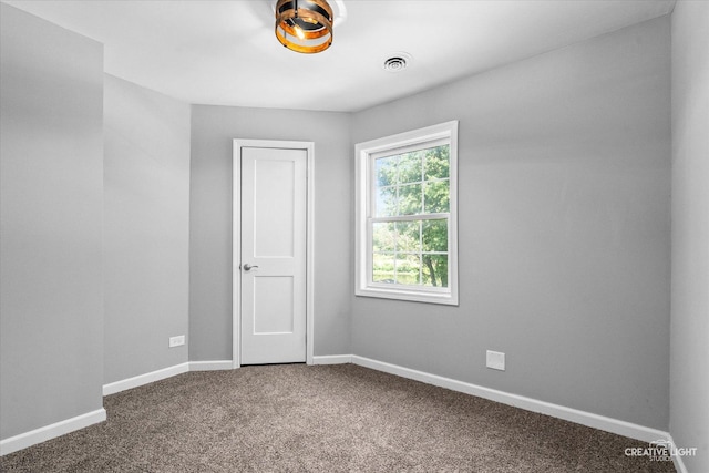455 N River St, Montgomery, IL 60538 - carpeted empty room with baseboards