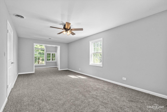 455 N River St, Montgomery, IL 60538 - carpeted spare room featuring healthy amount of natural light and ceiling fan