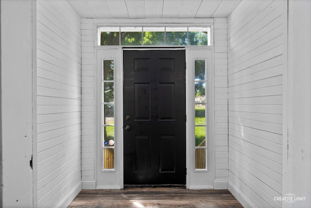 455 N River St, Montgomery, IL 60538 - foyer featuring dark wood-style floors, wooden walls, and wooden ceiling