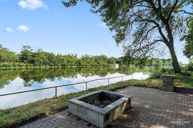 455 N River St, Montgomery, IL 60538 - view of patio / terrace with a fire pit and a water view