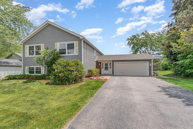 792 Ravenswood Ct, Lake Zurich, IL 60047 - view of front facade featuring a front lawn, driveway, and an attached garage