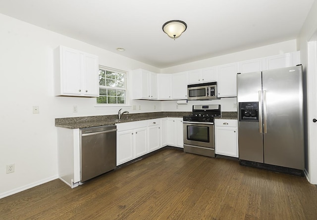 149 W Prairiefield Ave, Cortland, IL 60112 - kitchen with stainless steel appliances, dark wood-type flooring, white cabinetry, and a sink