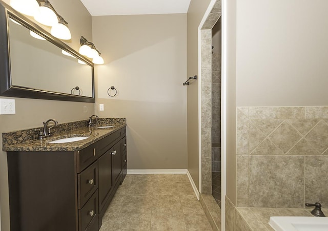 149 W Prairiefield Ave, Cortland, IL 60112 - bathroom with double vanity and tile patterned flooring