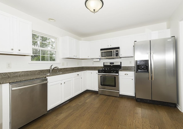 149 W Prairiefield Ave, Cortland, IL 60112 - kitchen with stainless steel appliances, dark wood-style flooring, and white cabinetry