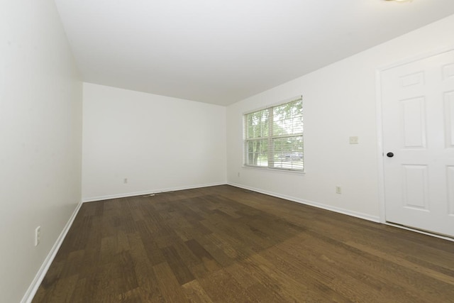149 W Prairiefield Ave, Cortland, IL 60112 - unfurnished room featuring dark wood-style floors and baseboards