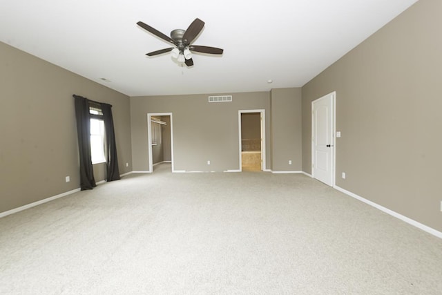 149 W Prairiefield Ave, Cortland, IL 60112 - empty room with a ceiling fan, baseboards, and light colored carpet