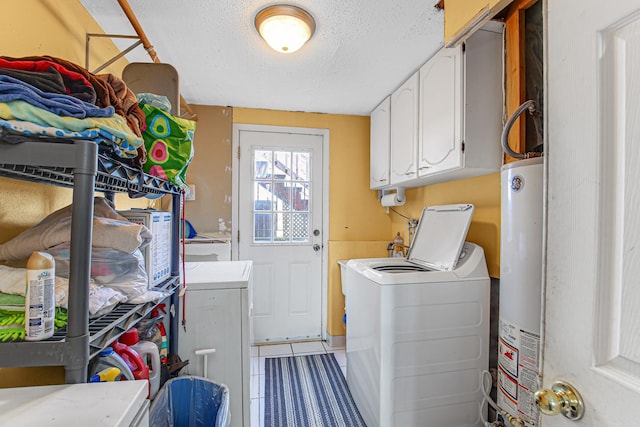 2105 Sanford Ave, New Lenox, IL 60451 - laundry area featuring washing machine and clothes dryer, water heater, a textured ceiling, light tile patterned flooring, and cabinet space