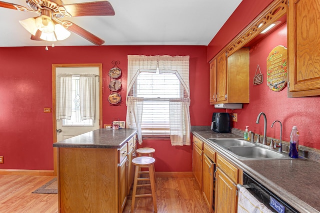 2105 Sanford Ave, New Lenox, IL 60451 - kitchen featuring light wood-style flooring, a ceiling fan, dishwasher, and brown cabinets