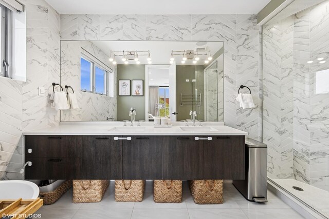 1233 N Paulina St Unit 3N, Chicago, IL 60622 - full bath with double vanity, tile patterned floors, tile walls, and walk in shower