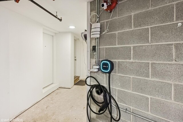 1233 N Paulina St Unit 3N, Chicago, IL 60622 - garage view of concrete flooring and electric vehicle charger