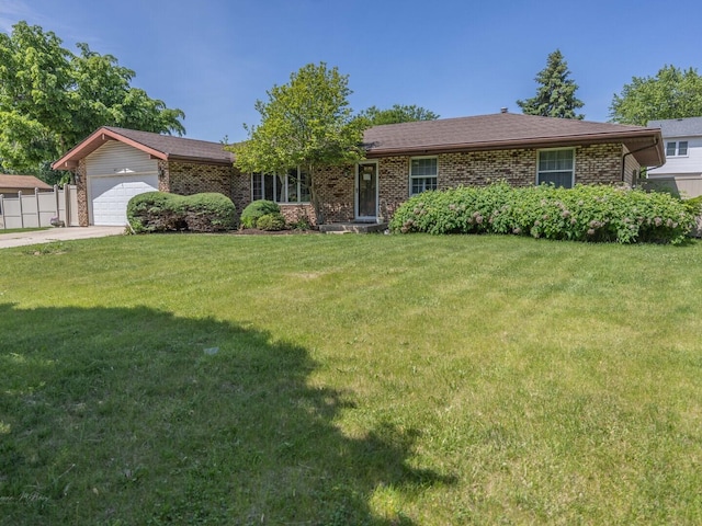 601 Fairlane Dr, Joliet, IL 60435 - ranch-style home featuring brick siding, a garage, and driveway