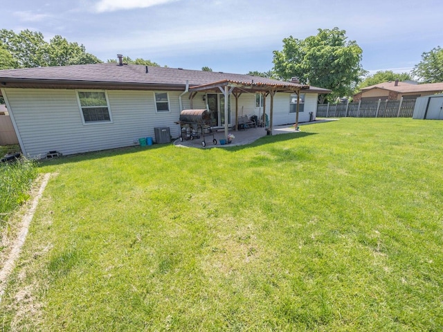 601 Fairlane Dr, Joliet, IL 60435 - rear view of house with a pergola, a patio area, and a storage shed