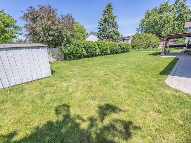 601 Fairlane Dr, Joliet, IL 60435 - view of yard featuring a storage unit