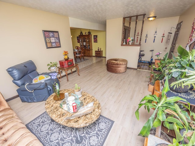 601 Fairlane Dr, Joliet, IL 60435 - living room with wood finished floors and a textured ceiling