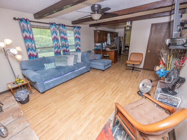 601 Fairlane Dr, Joliet, IL 60435 - living area with wood finished floors, a textured ceiling, and ceiling fan