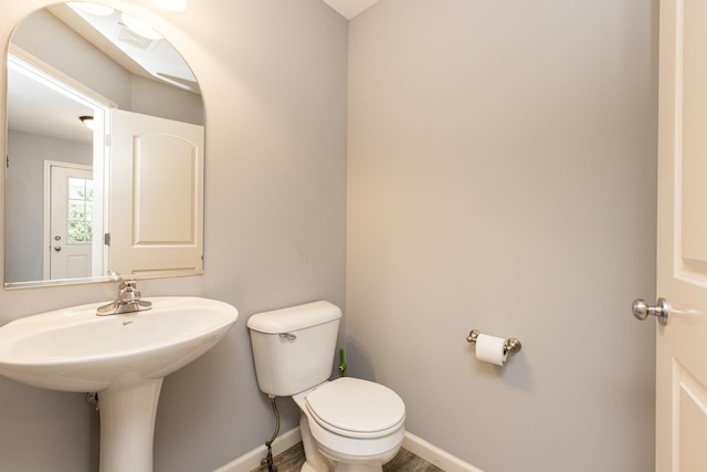 2521 Fox Trot Trl, Bloomington, IL 61705 - half bathroom with toilet and baseboards