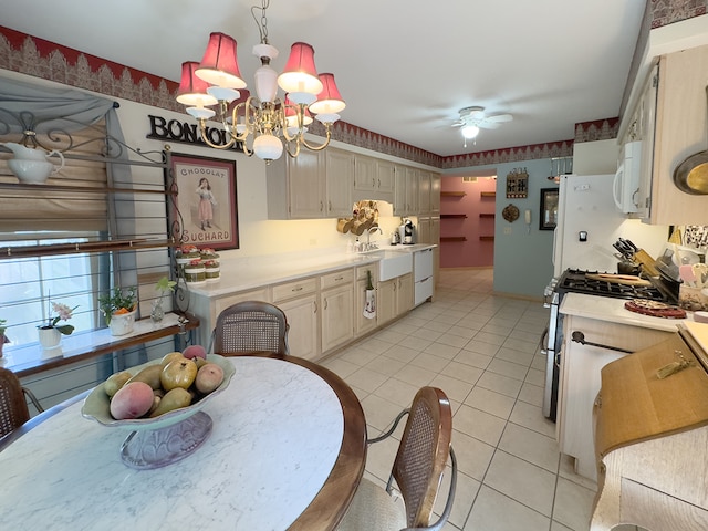 503 Shagbark Dr Unit 503, Elgin, IL 60123 - kitchen with white appliances, light countertops, light tile patterned floors, and ceiling fan