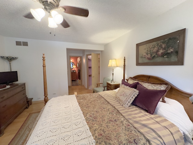 503 Shagbark Dr Unit 503, Elgin, IL 60123 - bedroom featuring a textured ceiling and a ceiling fan
