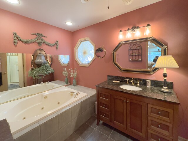 503 Shagbark Dr Unit 503, Elgin, IL 60123 - full bath featuring a whirlpool tub, tile patterned flooring, and vanity