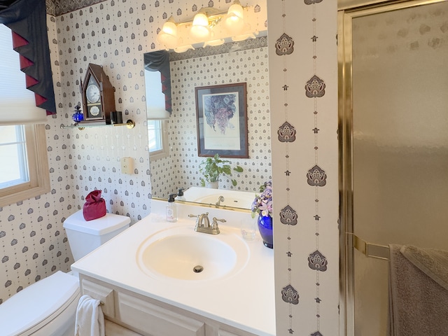 503 Shagbark Dr Unit 503, Elgin, IL 60123 - full bathroom with wallpapered walls, plenty of natural light, a shower with door, and vanity