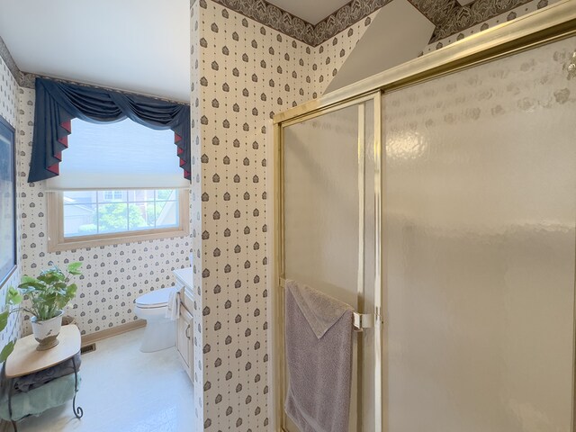 503 Shagbark Dr Unit 503, Elgin, IL 60123 - bathroom featuring wallpapered walls, a stall shower, and vanity