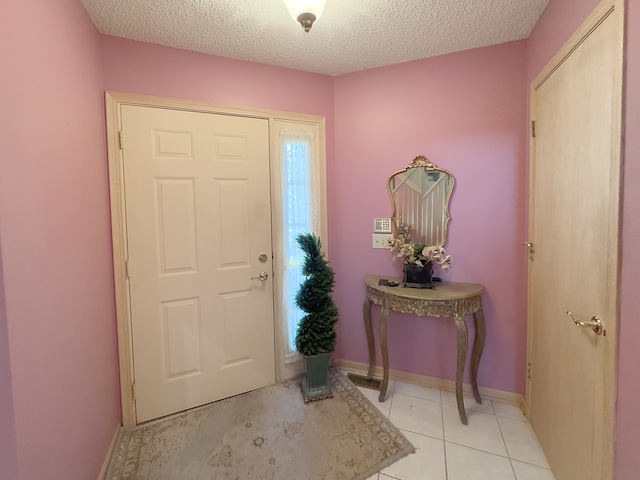 503 Shagbark Dr Unit 503, Elgin, IL 60123 - entryway with a textured ceiling and light tile patterned floors