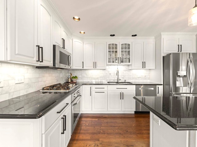 18210 W Winds Ln, Orland Park, IL 60467 - kitchen featuring appliances with stainless steel finishes, a sink, white cabinets, backsplash, and recessed lighting