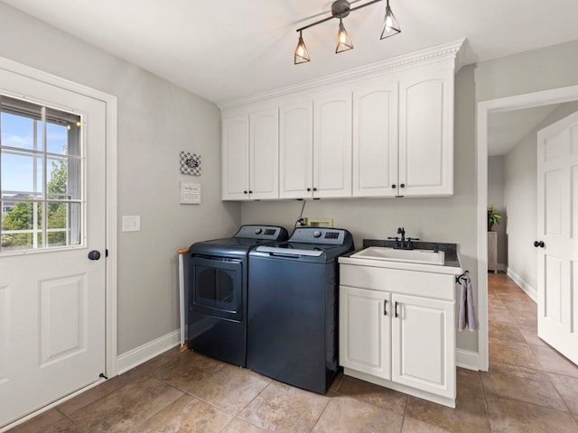 18210 W Winds Ln, Orland Park, IL 60467 - laundry room featuring washing machine and clothes dryer, cabinet space, baseboards, and light tile patterned floors