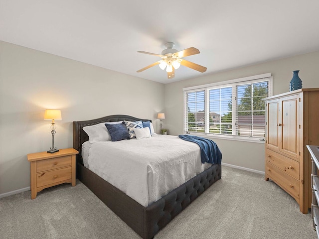 18210 W Winds Ln, Orland Park, IL 60467 - bedroom with baseboards, light carpet, and ceiling fan
