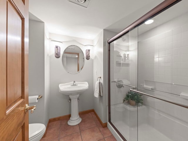 18210 W Winds Ln, Orland Park, IL 60467 - full bathroom with toilet, baseboards, a stall shower, and tile patterned flooring
