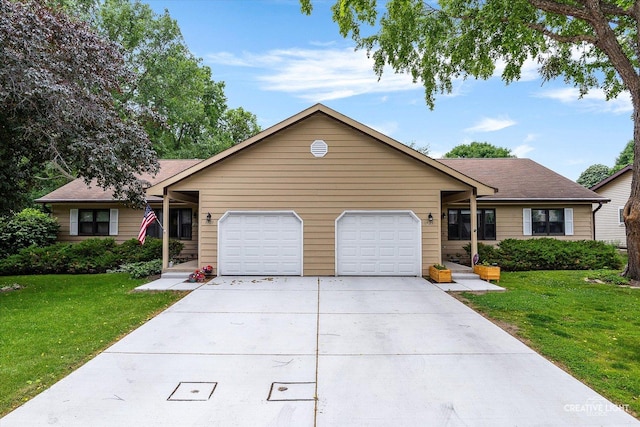 1923-25 Monday Dr, Elgin, IL 60123 - ranch-style house featuring concrete driveway, an attached garage, and a front yard